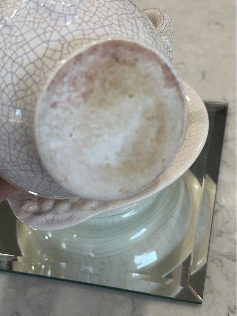 Farmhouse-style pitcher and basin set, featuring a distinct white crackle finish